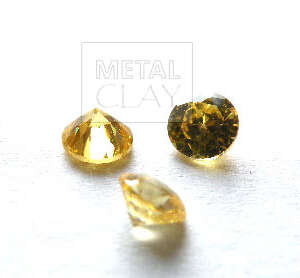 cyrkonia okrągła gold 4 mm